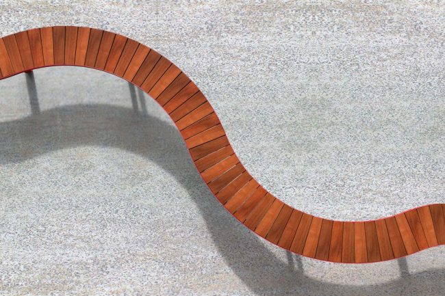 Curved modules from above. Powder coated red, timber battens.